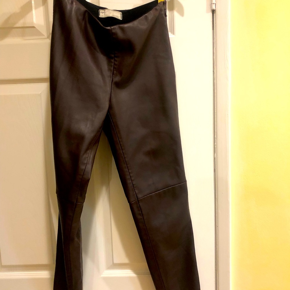Free people brown leather pants size 2 with the zipper on the bottom of legs.